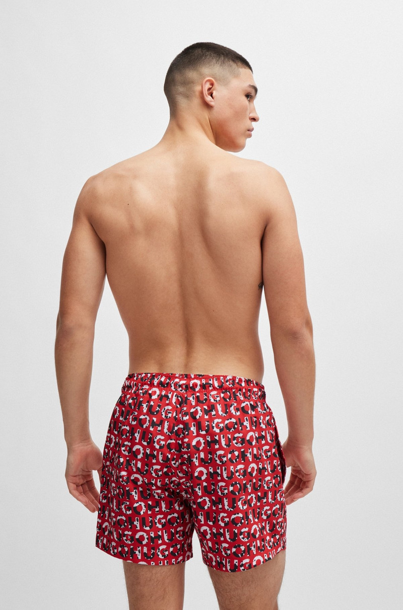HUGO -MATERIAL SWIM SHORTS WITH LOGO PRINT outlook