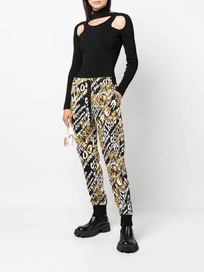 VERSACE JEANS COUTURE monogram-print track-pants outlook