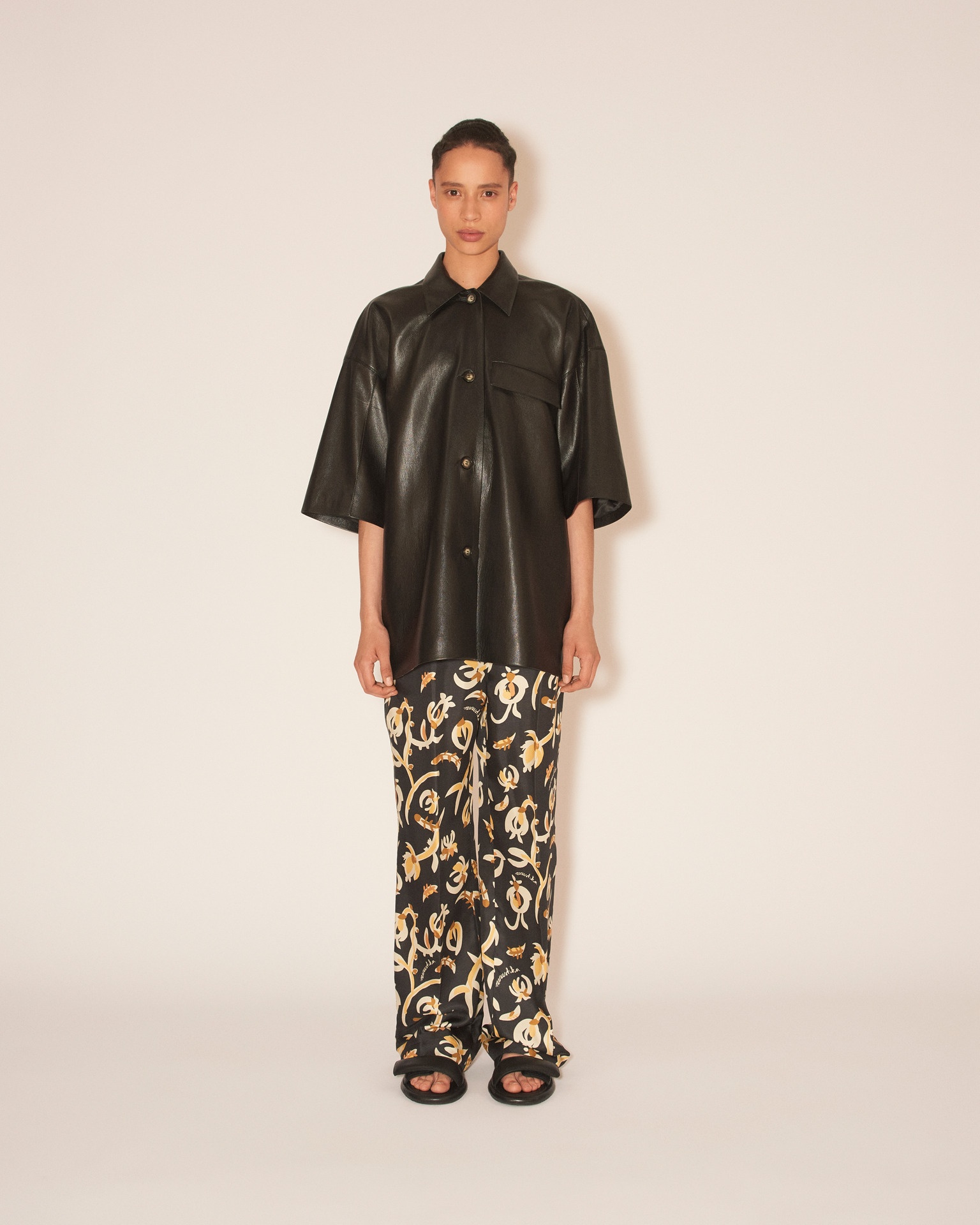 MILLO - Track pants - Naive floral black - 2
