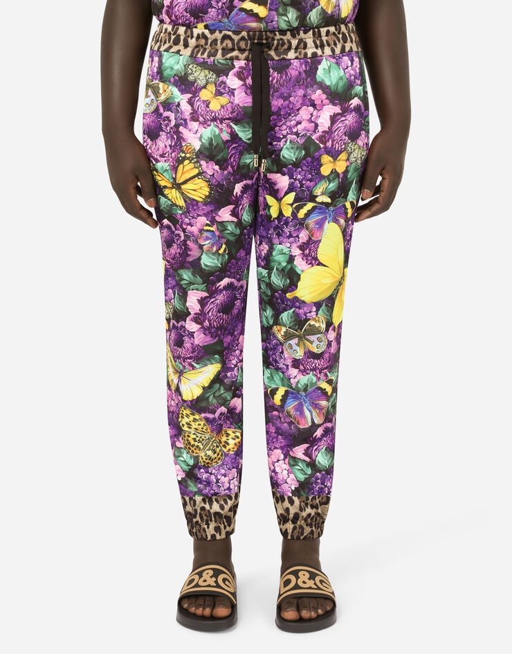 Jogging pants with butterfly print - 1