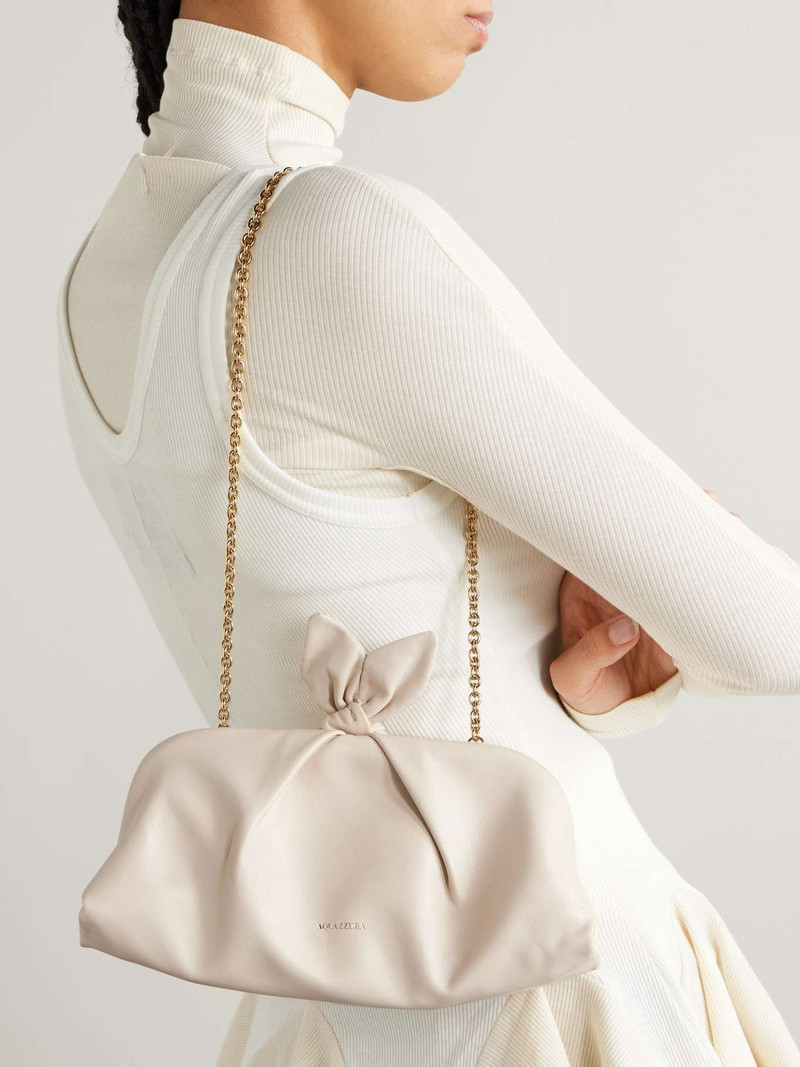 AQUAZZURA Bow-detailed leather clutch Ivory outlook