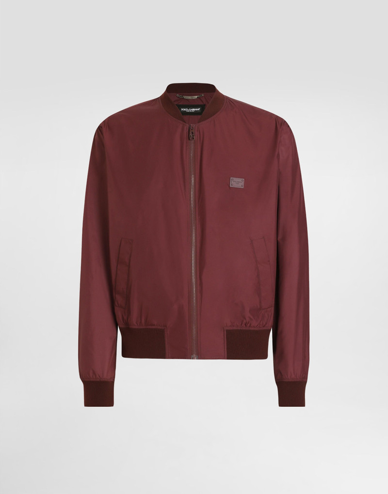 Technical fabric bomber jacket with tag 1