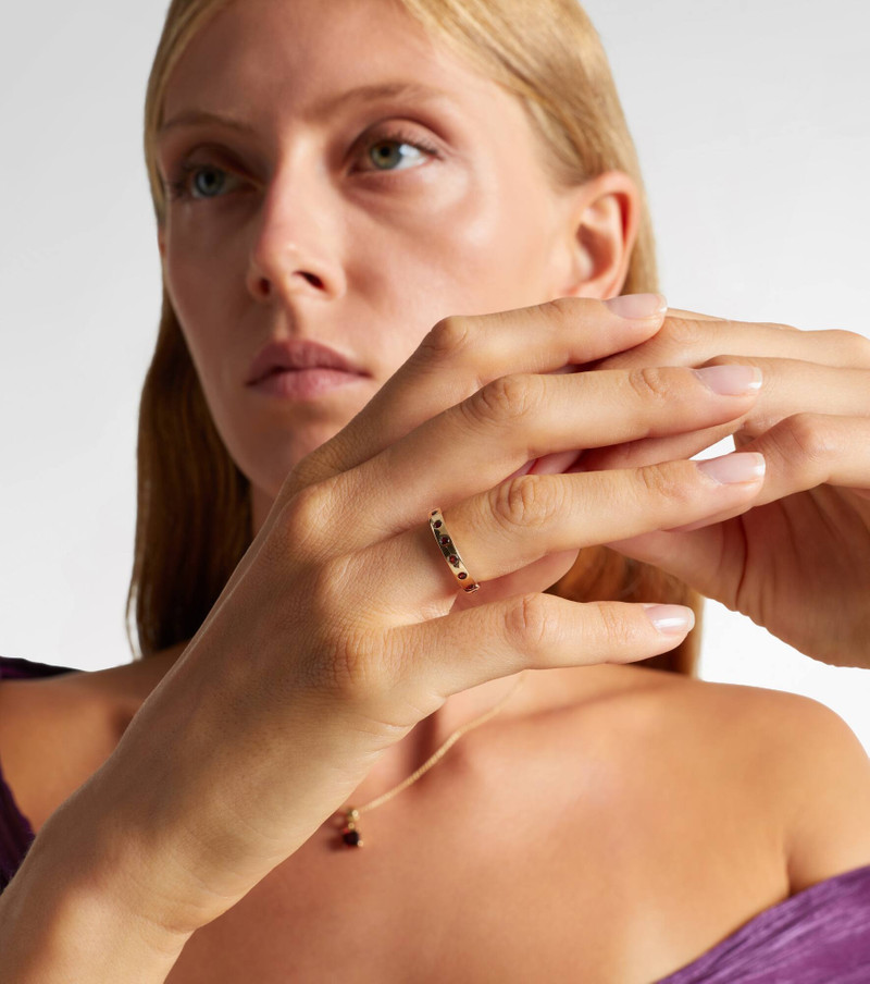STONE AND STRAND 10kt gold ring with garnet outlook