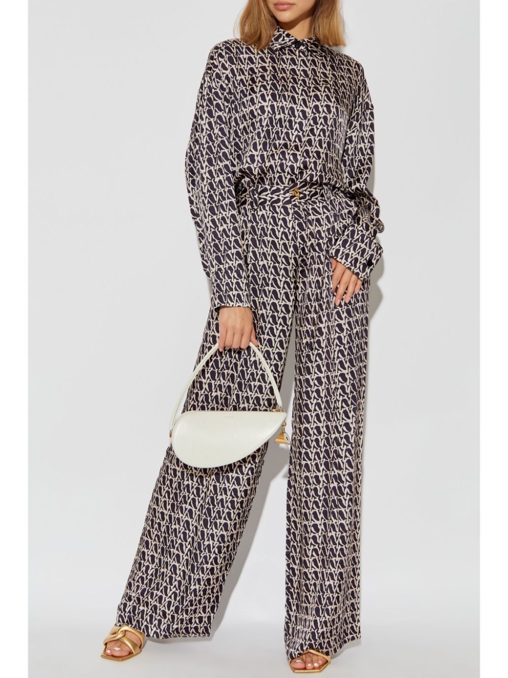 Wellen monogram-print trousers - 2
