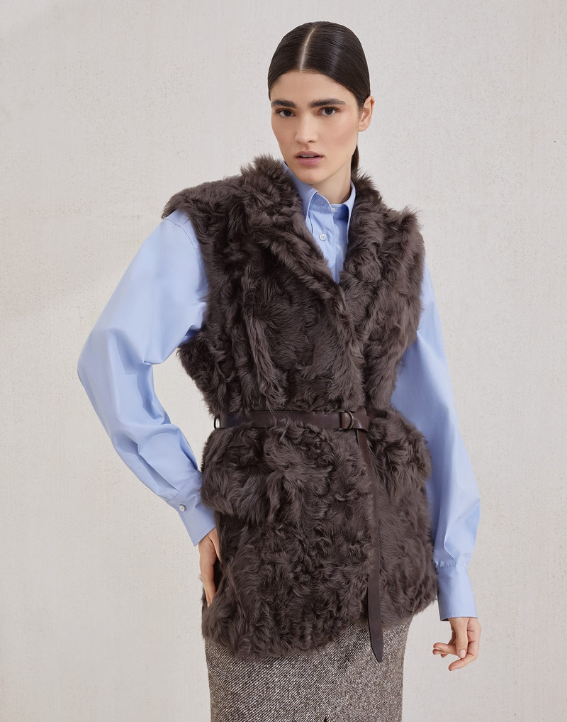 Wavy shearling vest with leather belt and monili 1