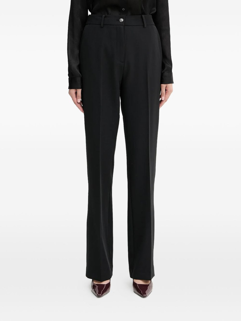 button-fastening trousers 1