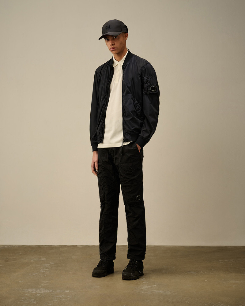 C.P. Company Stretch Piquet Three-Button Logo Polo outlook