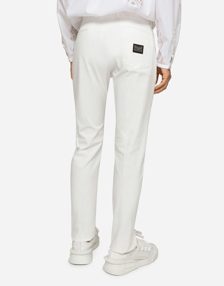 Stretch cotton pants with branded tag - 4