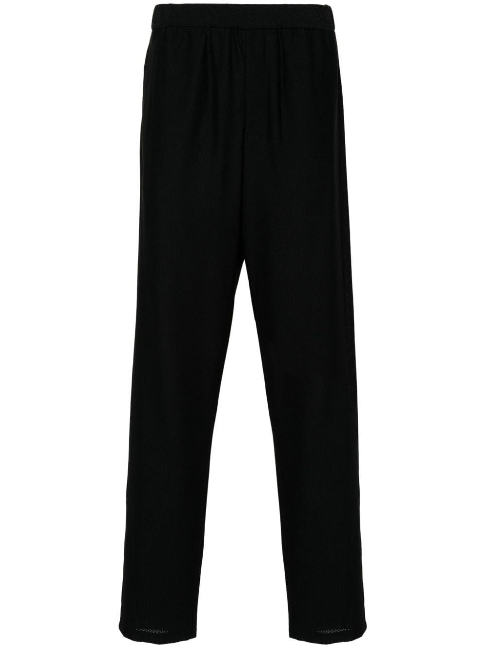 waffle-effect tapered trousers - 1