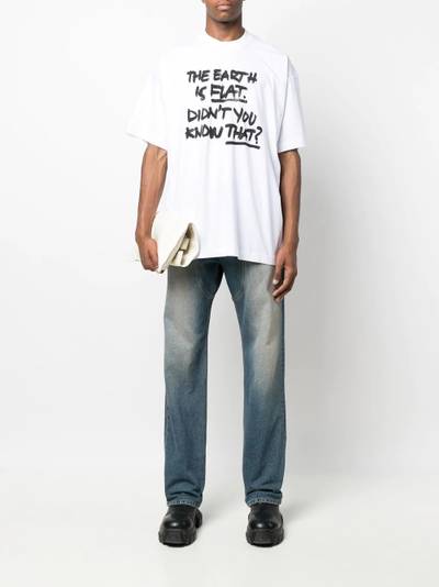 VETEMENTS slogan-print oversized T-shirt outlook