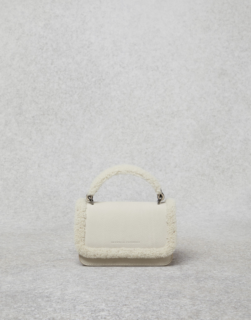 Nubuck city bag with monili and shearling details 1