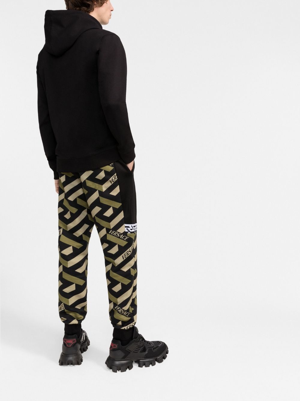 Greca-pattern logo-print trousers - 4