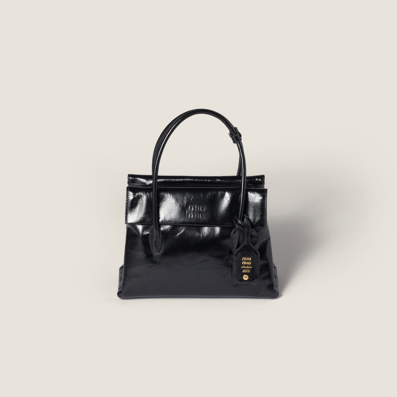 Solitaire shiny leather bag 1