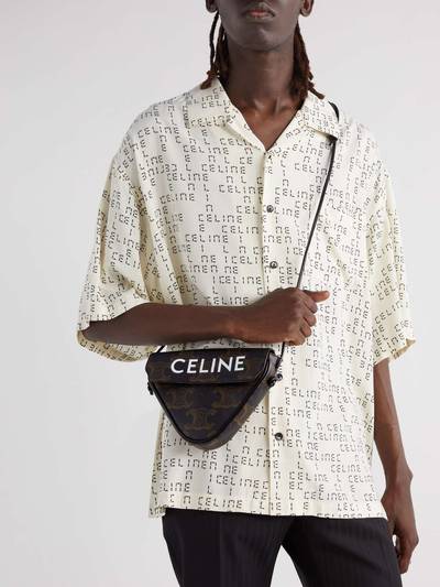 CELINE Triangle Triomphe Leather-Trimmed Logo-Print Coated-Canvas Messenger Bag outlook