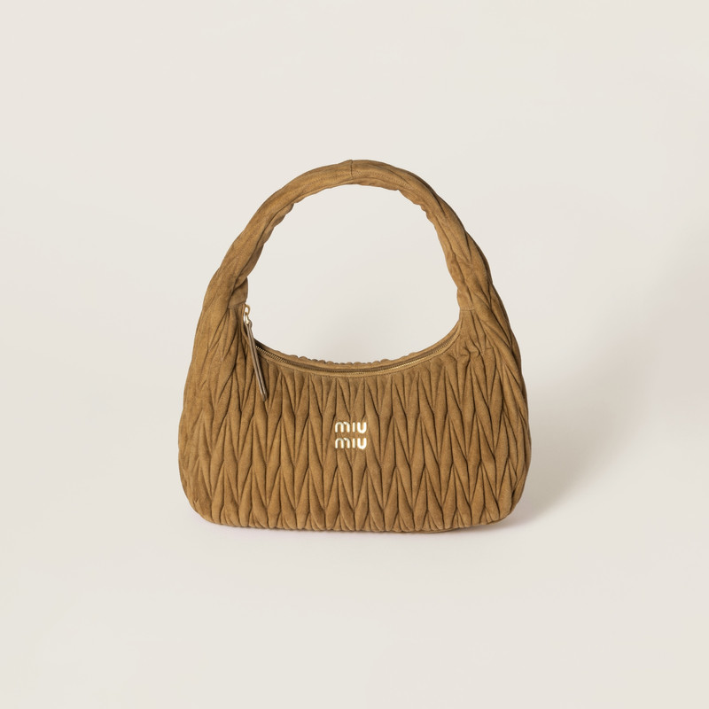 Wander matelassé suede bag 1