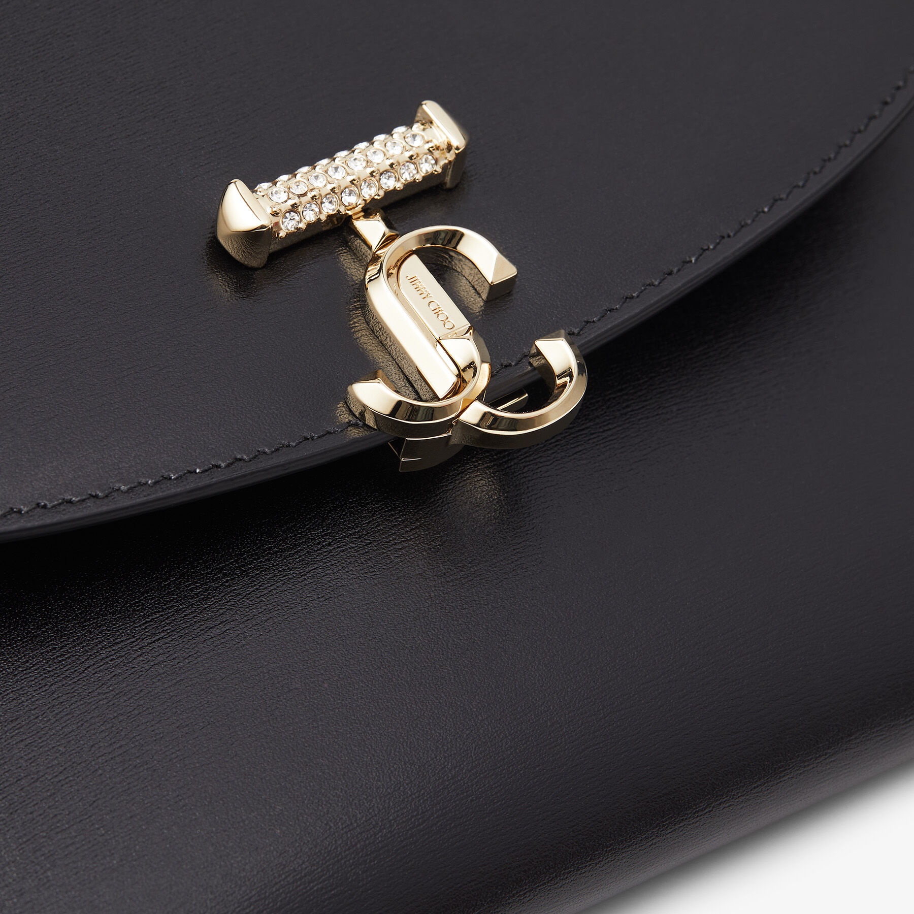 JC Envelope Pouch
Black Leather Pouch with Crystal Bar and Gold JC Emblem 4