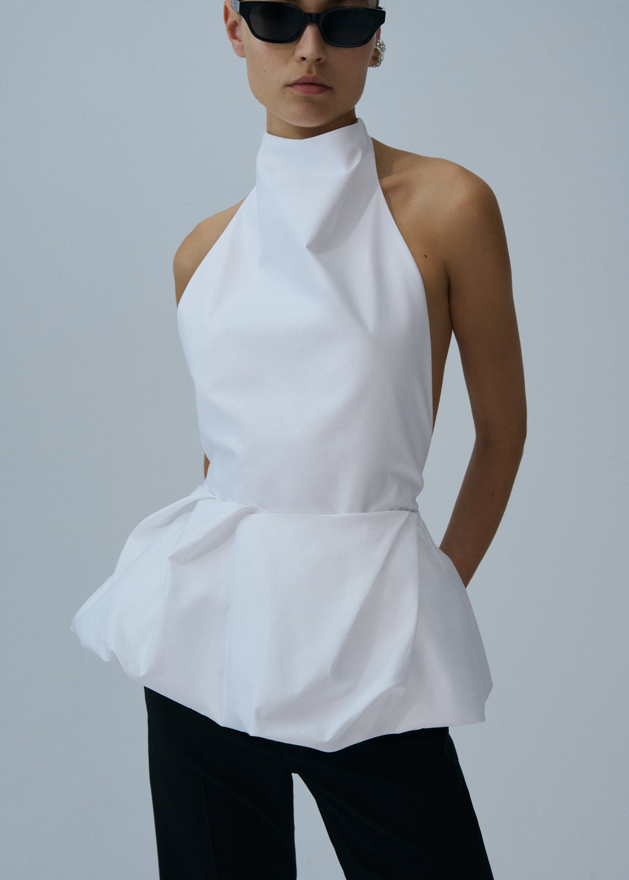Halter peplum top in white - 3