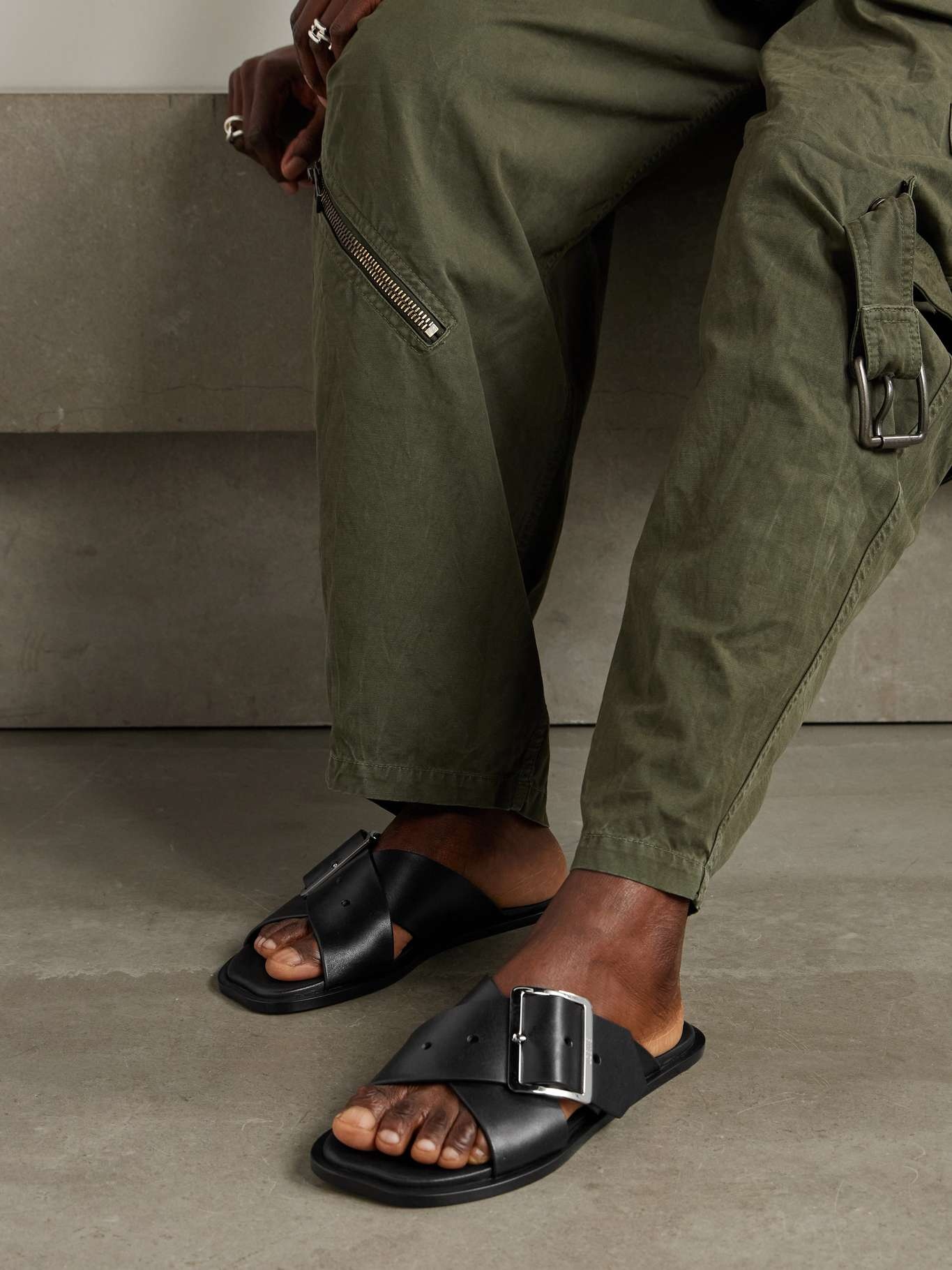 Loewe Petal Belt buckled leather slides Black | netaporter
