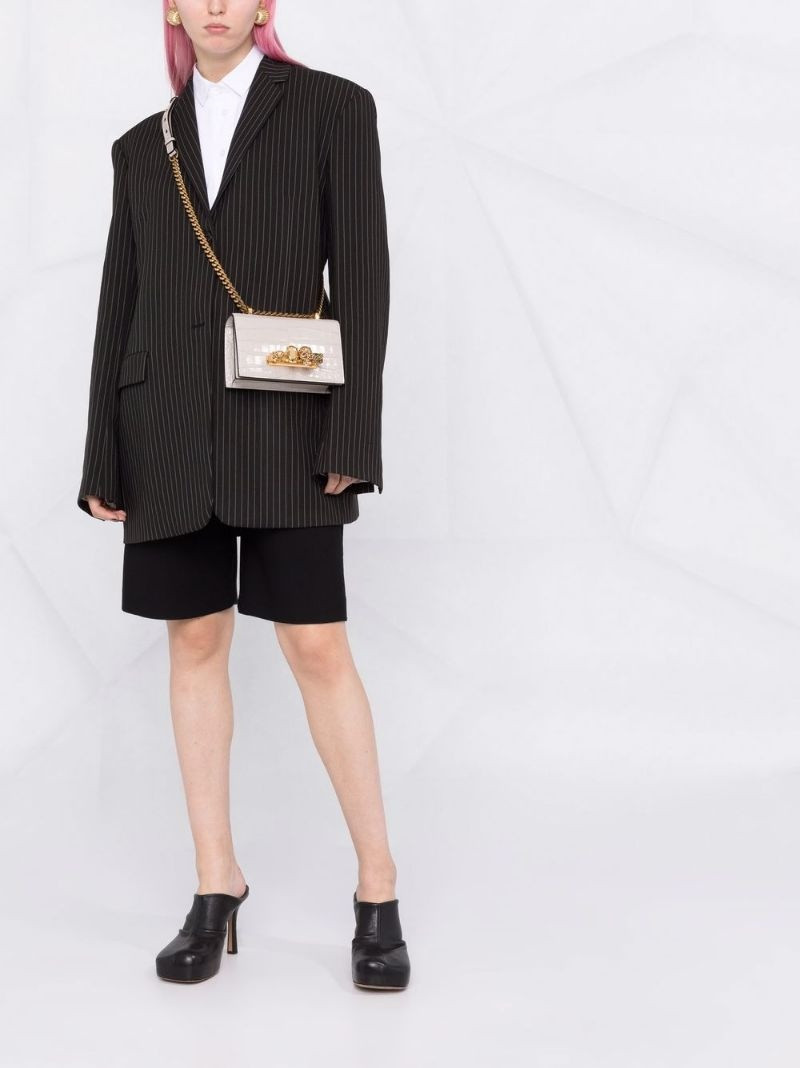 Alexander McQueen knuckleduster crossbody bag outlook