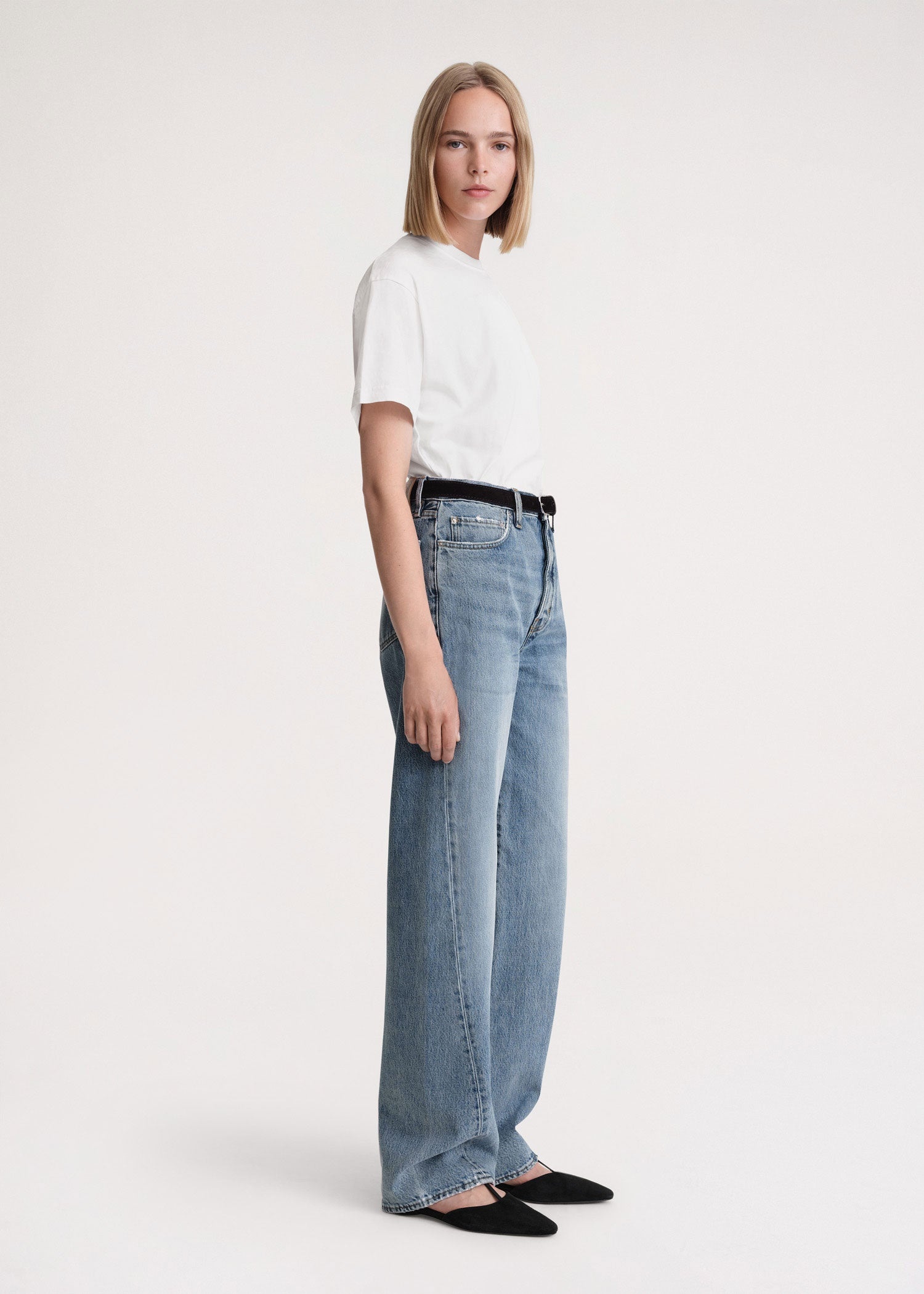 Totême Twisted seam denim full length worn blue | REVERSIBLE