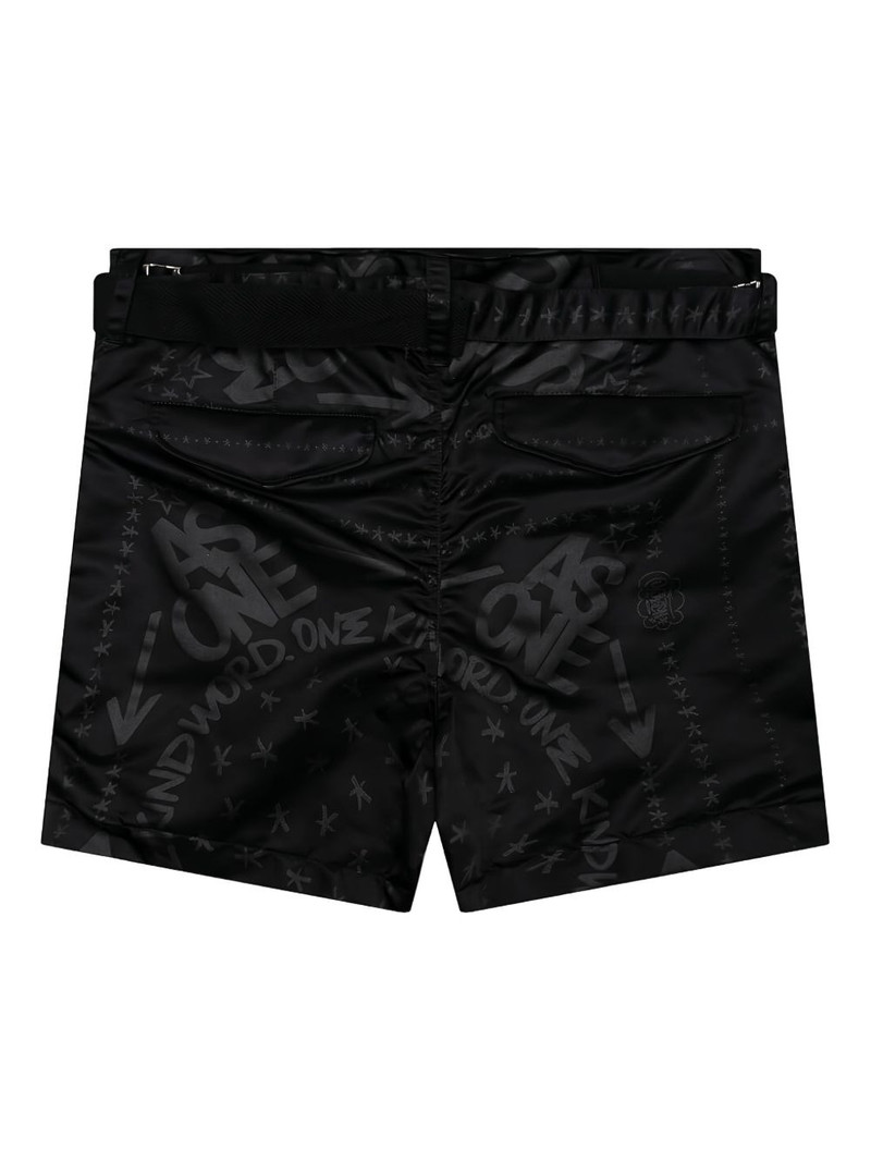 sacai x Eric Haze bandana-print belted shorts outlook