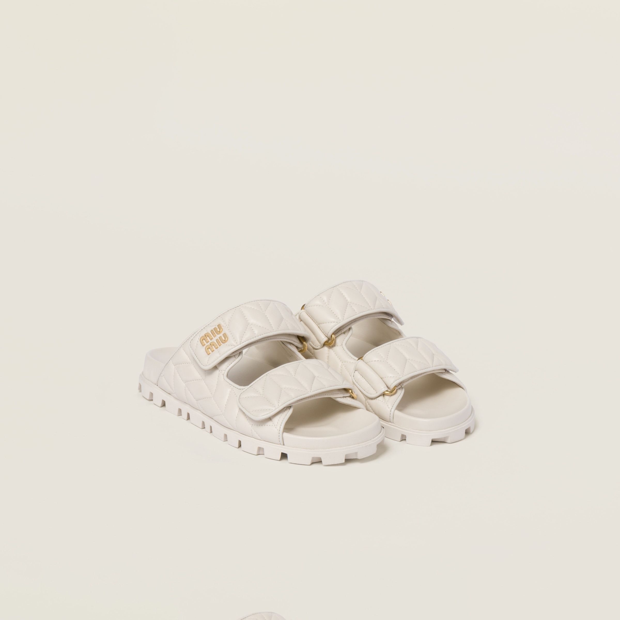 Matelassé nappa leather slides - 1