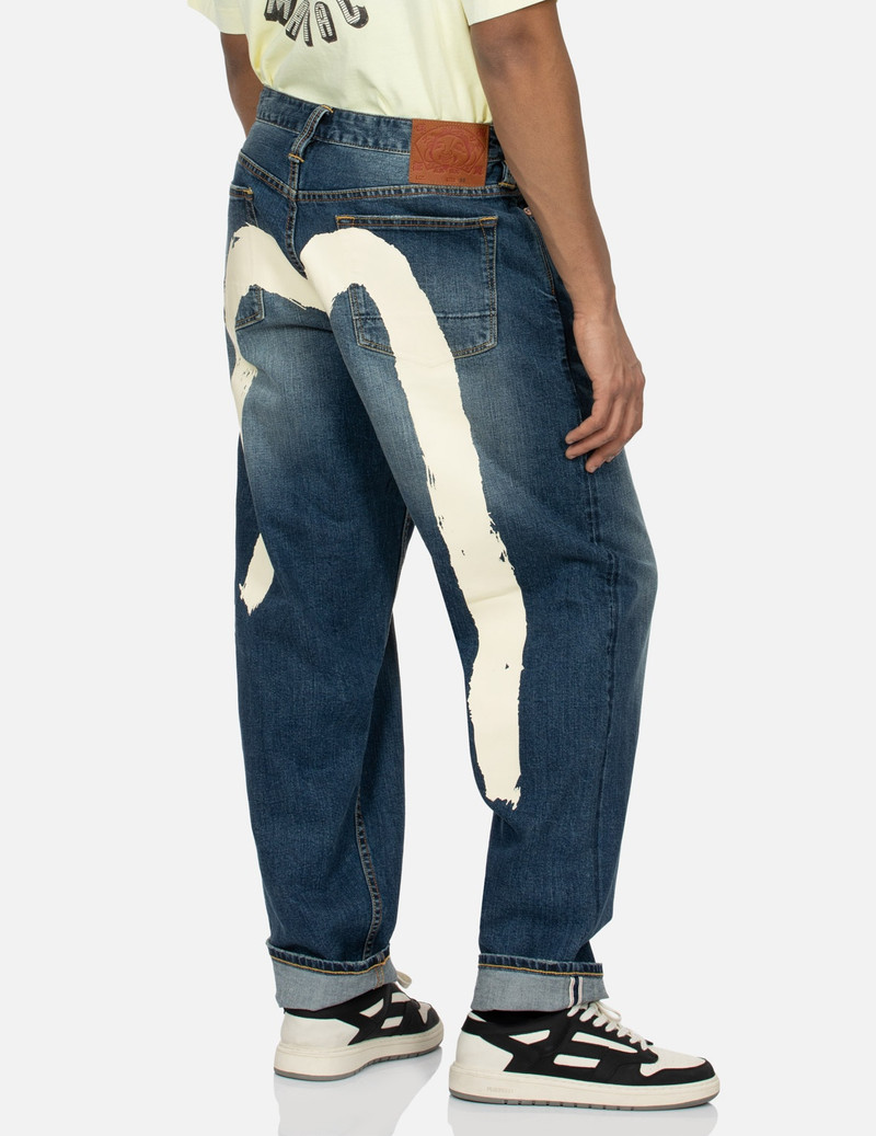 EVISU ECRU BRUSHSTROKE DAICOCK LOOSE FIT JEANS outlook