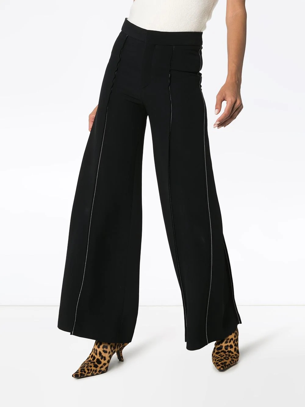 contrast-stitch flared trousers - 3