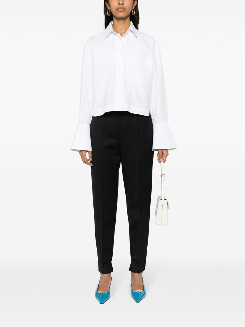 Prada pressed-crease tapered-leg trousers outlook