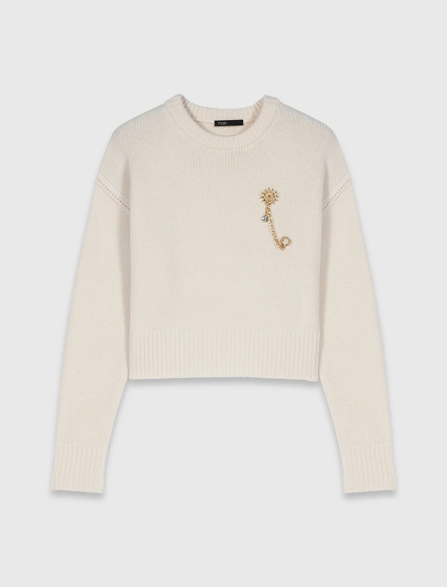 Jumper with floral brooch - 1