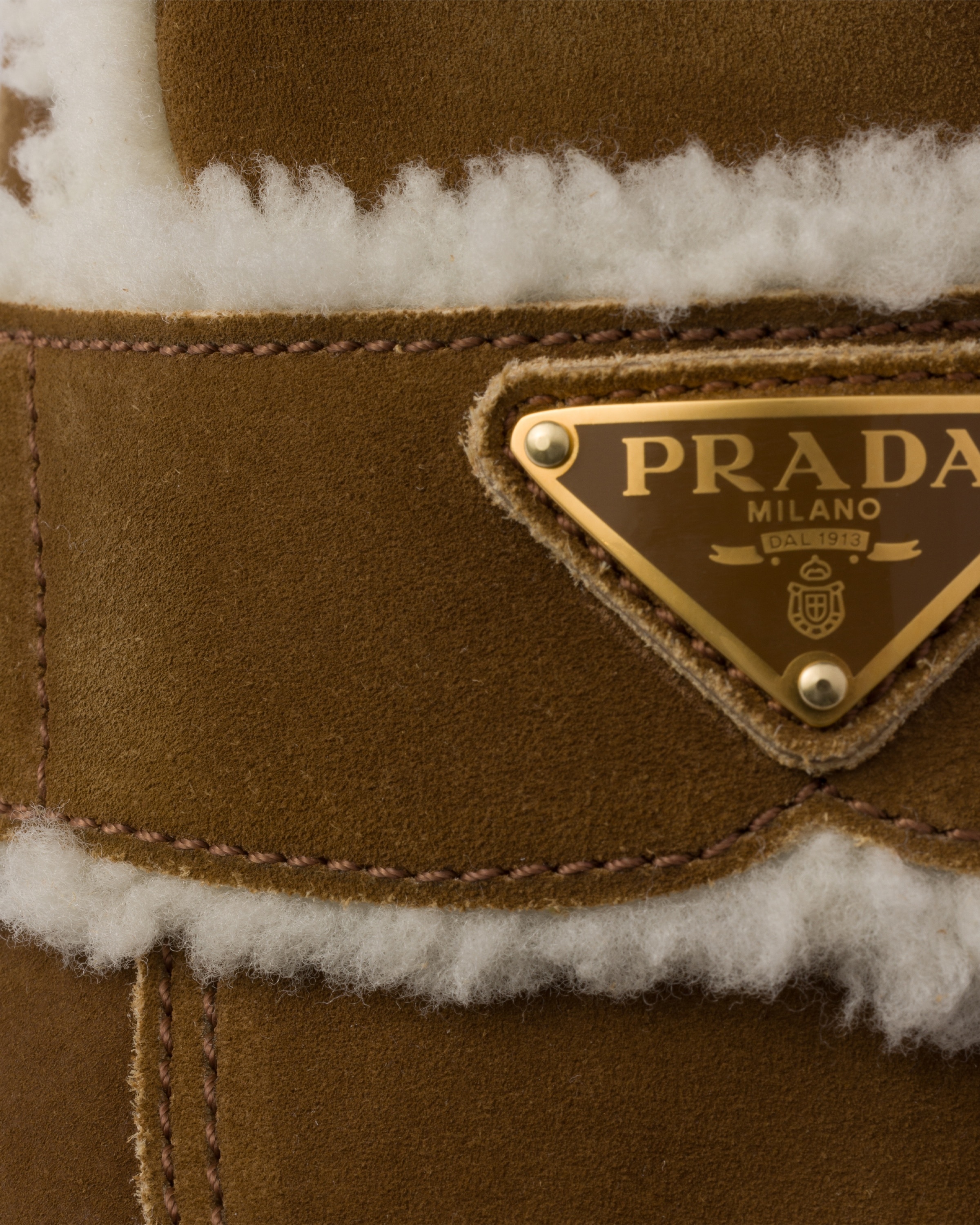 サンダル・ミュール PRADA SHEARLING SLIPPERS Prada Suede and shearling slippers | REVERSIBLE