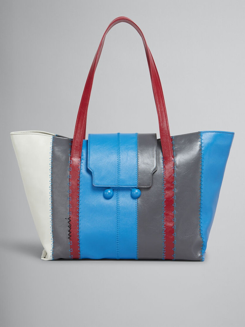 LIGHT BLUE, GREY, AND WHITE LEATHER TRUNKAROO LARGE BAG 1