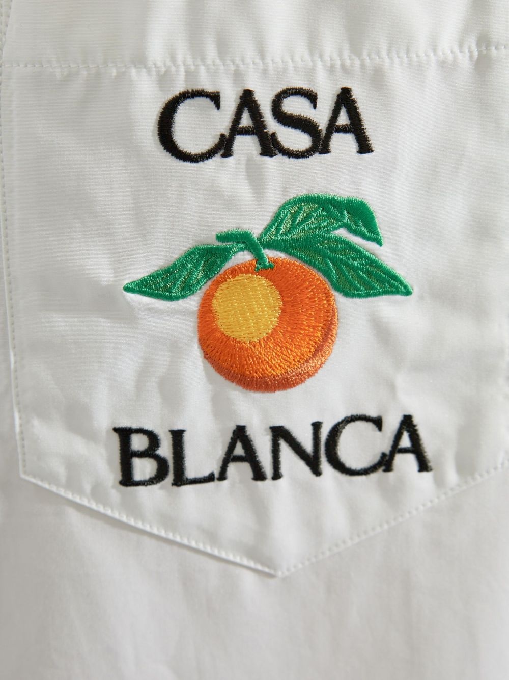 orange-embroidered shirt - 5