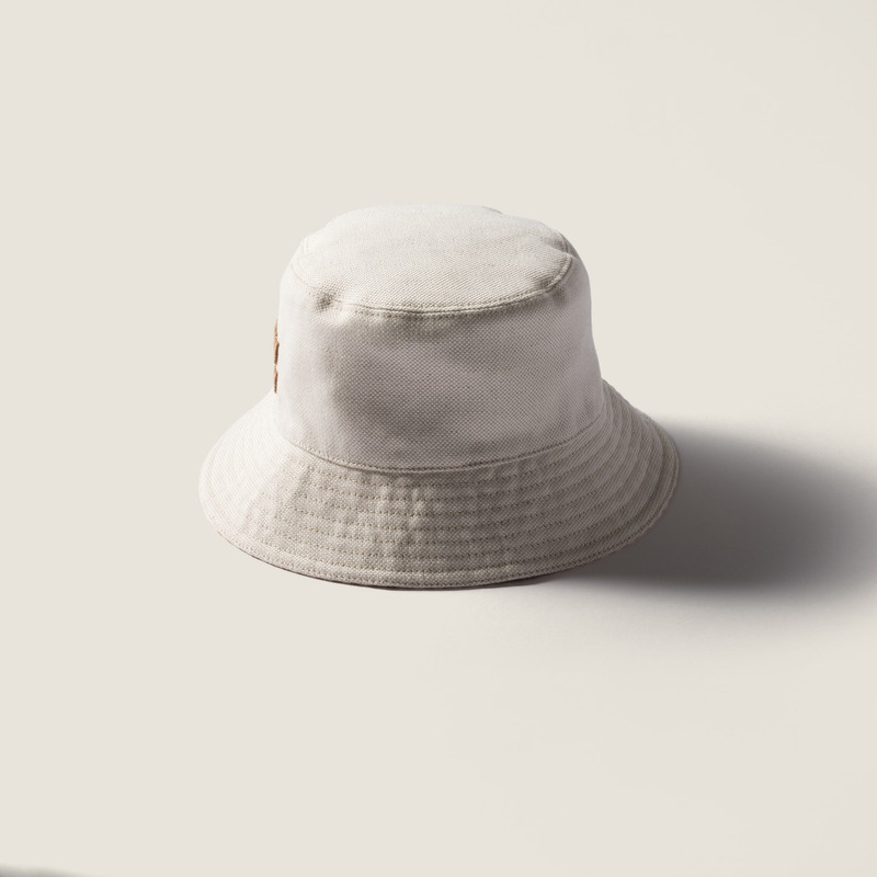 Miu Miu Reversible hat with pouch outlook