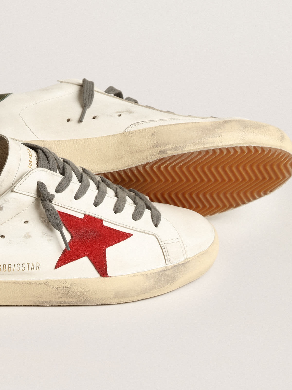 Golden Goose Super-Star with red suede star and green leather heel