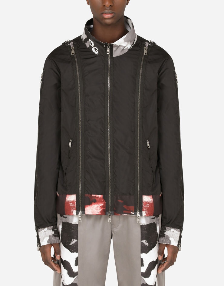 Jacket with multiple zippers and camouflage-print inserts - 1