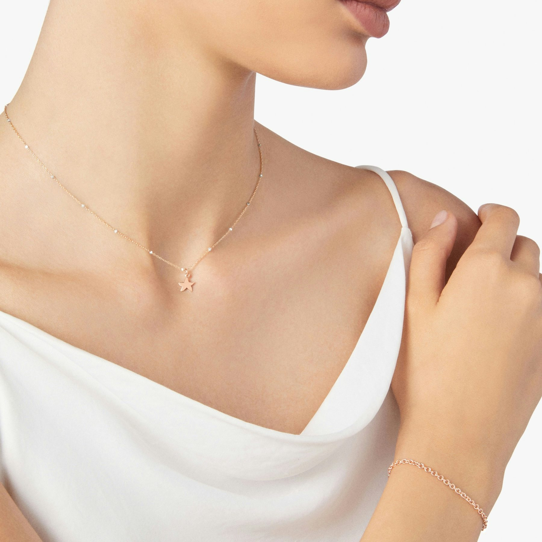 ROSE GOLD MINI STAR NECKLACE - 3