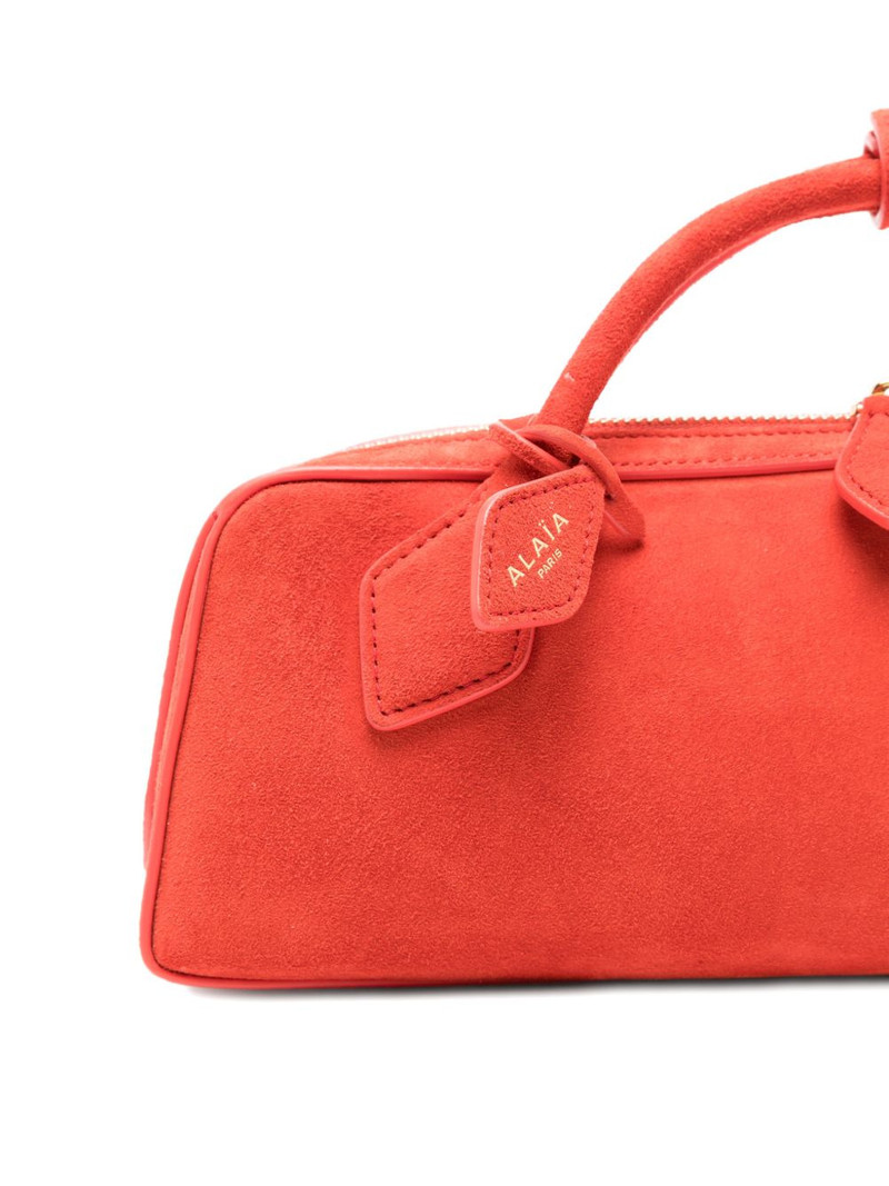 Le Teckel top handle clutch bag 4