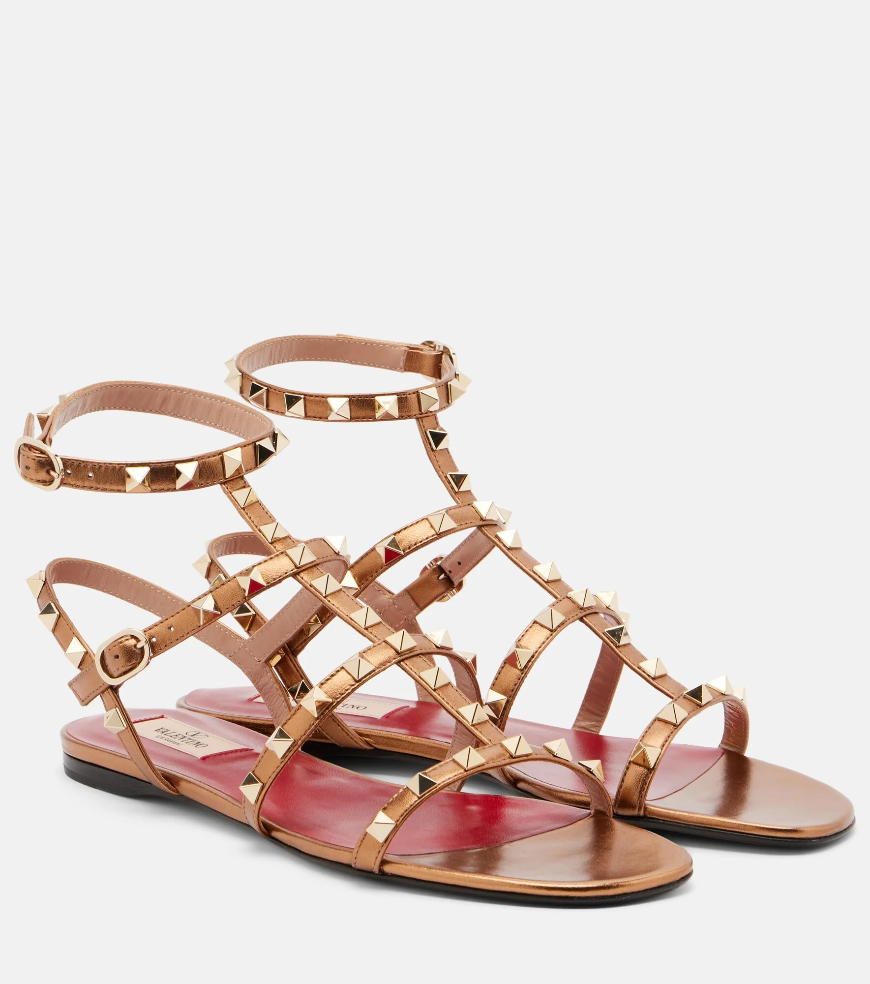 Rockstud metallic leather sandals - 1
