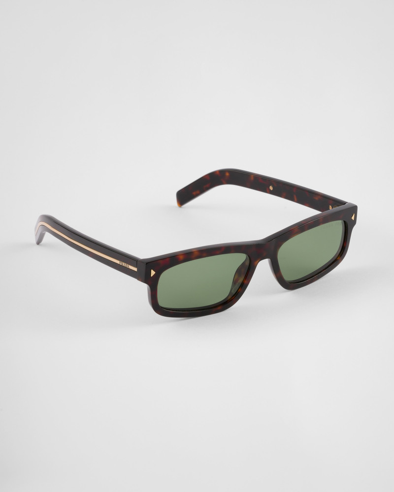 Prada Sunglasses with the iconic metal plaque outlook