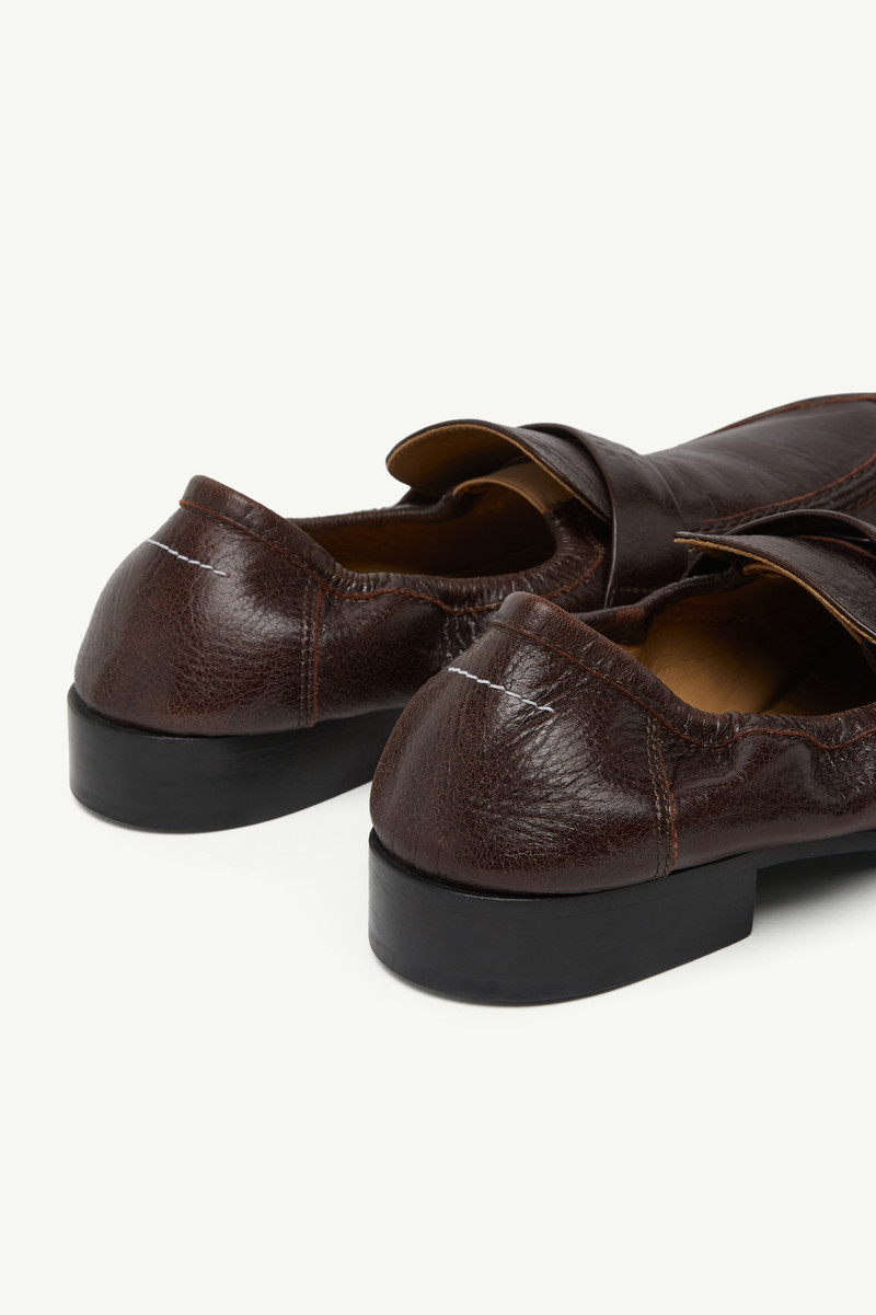 Swing-toe leather loafers 5