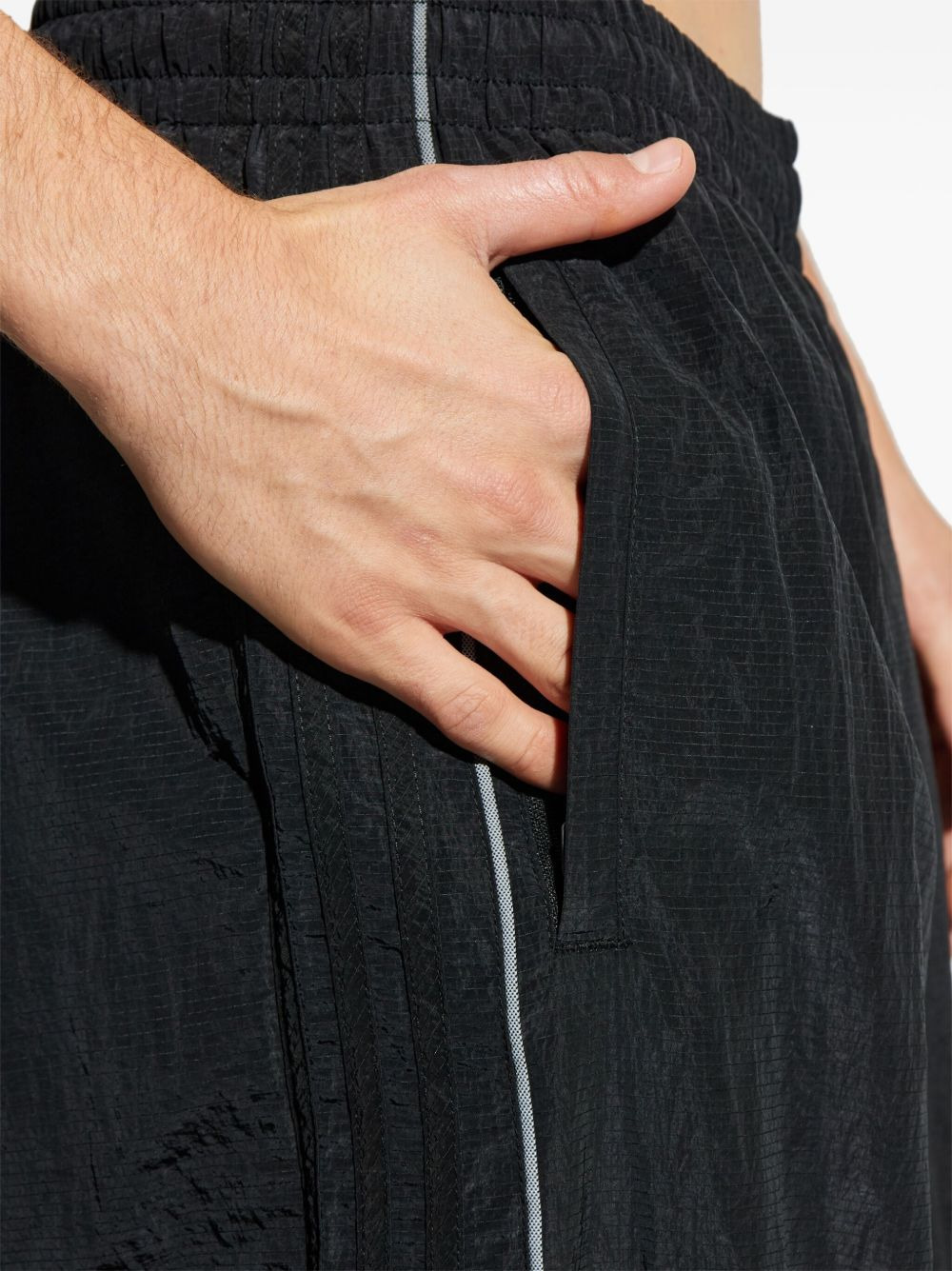 elasticated curved-line trousers - 4