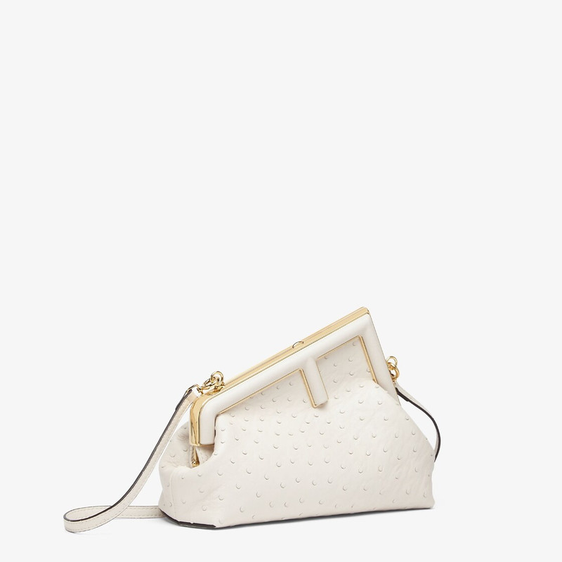 FENDI Small Fendi First bag made of exquisite white ostrich leather with oversized metal F clasp bound in  outlook