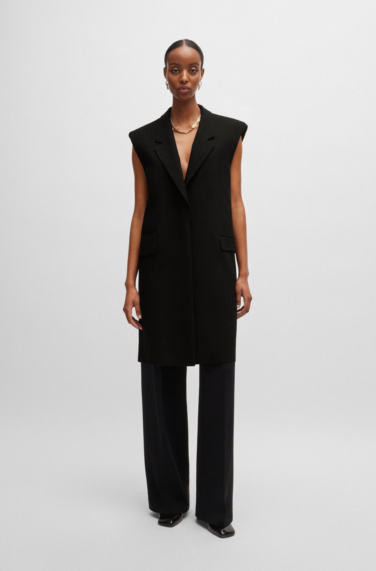 SLEEVELESS JACKET WITH CONCEALED CLOSURE AND SIGNATURE LINING - 2