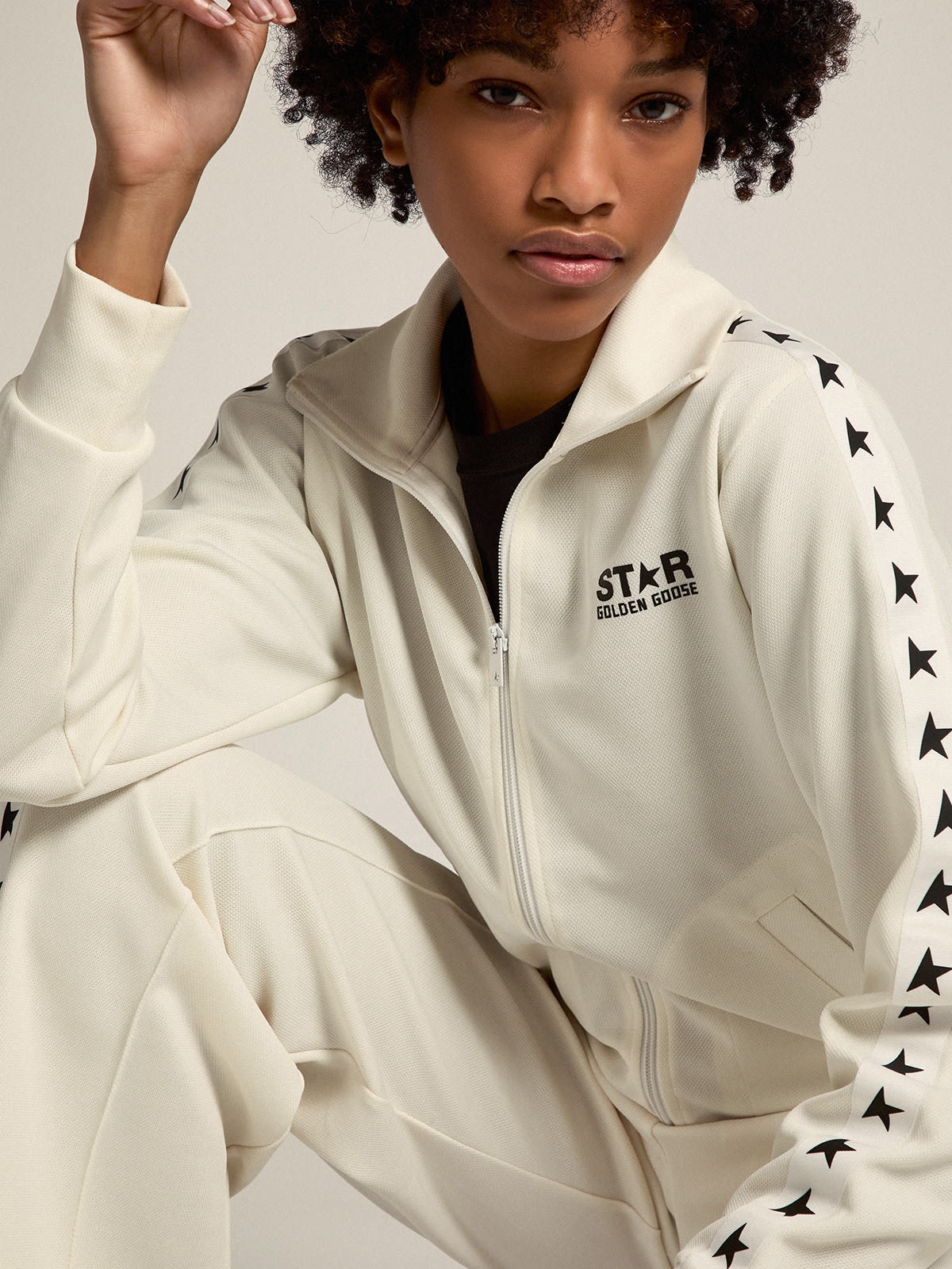 Women’s white zipped sweatshirt with white strip and black stars - 4