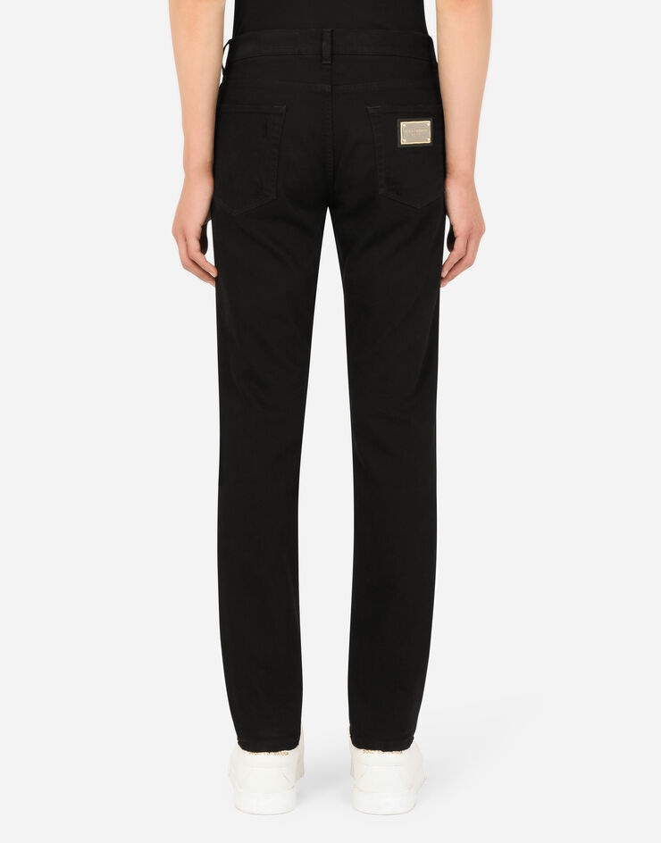 Black slim-fit stretch jeans with rips - 2