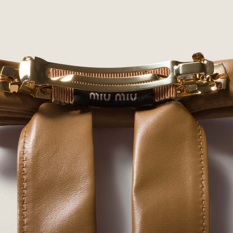 Miu Miu Leather bow hair clip outlook