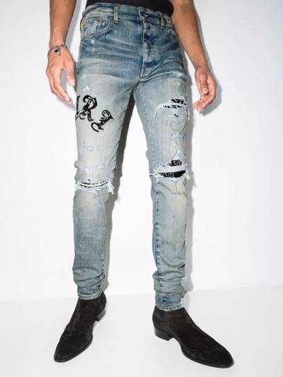 AMIRI Old English logo skinny jeans outlook