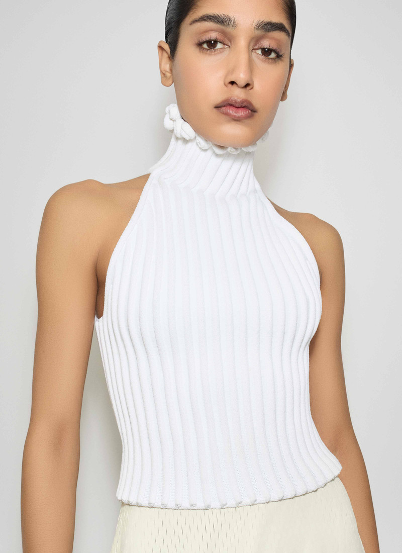 Alaïa RIBBED KNIT CURLED TRIMMED HALTER TOP outlook