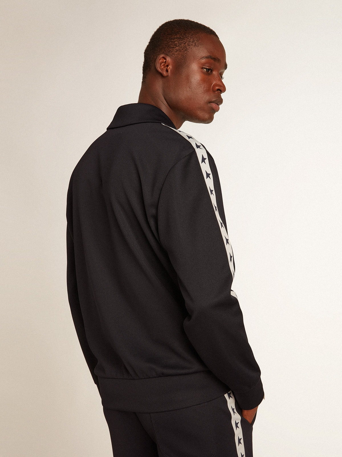 Dark blue sweatshirt with white strip and contrasting blue stars - 4